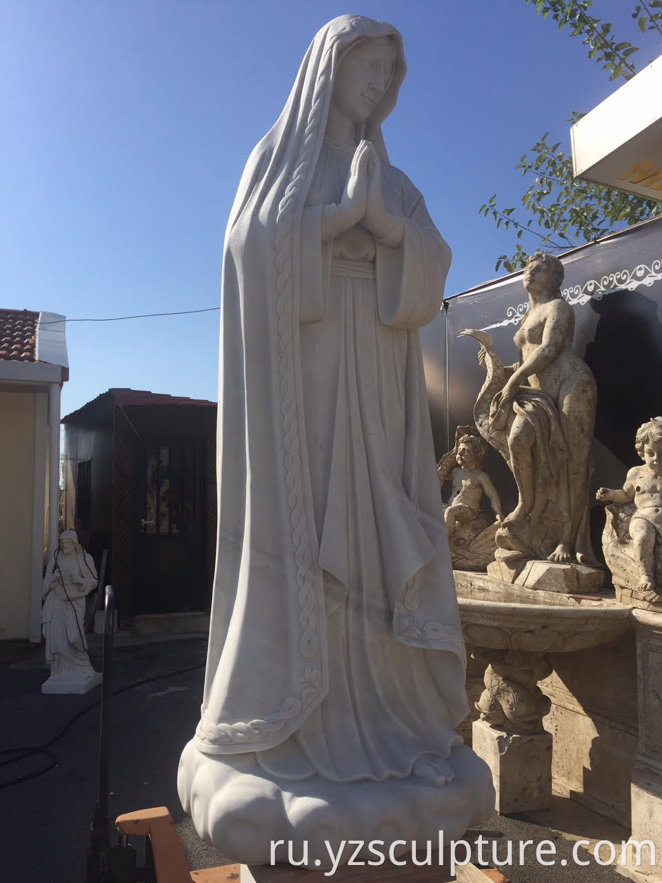 white marble virgin mary statue